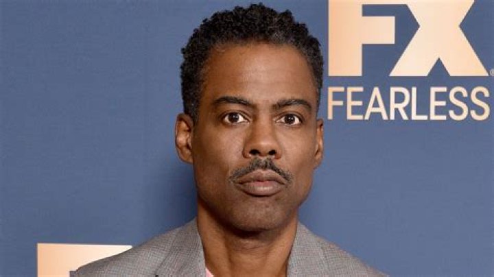 
Who is Fely Yigle? Black woman in blue sweater at Chris Rock’s Selective Outrage goes viral 